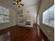 Spacious living room with hardwood floors and large windows at 800 Lake Marion Dr, Altamonte Springs, FL 32701