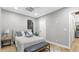 Light-filled bedroom with a queen bed and built-in bench at 806 Palmer St, Orlando, FL 32801