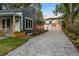 Updated home with gray pavers and beautiful landscaping at 806 Palmer St, Orlando, FL 32801