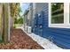 Rear exterior of house showing AC units and landscaping at 806 Palmer St, Orlando, FL 32801