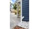 Side view of the house showing the drainage system and paved walkway at 806 Palmer St, Orlando, FL 32801