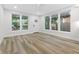 Spacious living room with hardwood floors and large windows at 806 Palmer St, Orlando, FL 32801