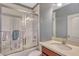 Clean bathroom with a shower/tub combo and modern vanity at 8749 Via Tavoleria Way, Windermere, FL 34786