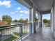 Spacious balcony overlooking lake and park at 8758 Pinter St, Orlando, FL 32827