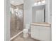 Clean bathroom with walk-in shower and white vanity at 8758 Pinter St, Orlando, FL 32827