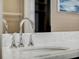 Vanity with modern chrome faucet and marble countertop at 8758 Pinter St, Orlando, FL 32827