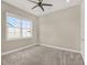 Bright bedroom with neutral walls and carpet flooring at 8758 Pinter St, Orlando, FL 32827