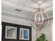 Modern spherical chandelier with a metallic finish at 8758 Pinter St, Orlando, FL 32827