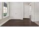 Bright hallway with double doors and hardwood floors at 8758 Pinter St, Orlando, FL 32827