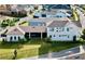 Aerial view of a house showcasing a large backyard and detached garage at 9062 Sperry St, Orlando, FL 32827