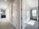 Hallway with multiple doors and plush carpeting at 9062 Sperry St, Orlando, FL 32827