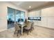 Kitchen nook with white cabinets and sliding glass door to patio at 9062 Sperry St, Orlando, FL 32827