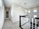 Upstairs hallway with carpet and neutral color walls at 9062 Sperry St, Orlando, FL 32827