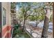 Private balcony with lush landscaping at 911 N Orange Ave # 214, Orlando, FL 32801