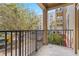 Private balcony with treetop views at 911 N Orange Ave # 214, Orlando, FL 32801