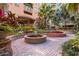 Tranquil courtyard with fountain and lush landscaping at 911 N Orange Ave # 214, Orlando, FL 32801