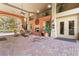 Inviting patio with fireplace and comfortable seating at 911 N Orange Ave # 214, Orlando, FL 32801