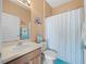 Clean bathroom with shower, toilet and vanity at 914 Shadowmoss Dr, Winter Garden, FL 34787