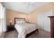 Bright bedroom with double bed, nightstands, and ample closet space at 914 Shadowmoss Dr, Winter Garden, FL 34787