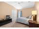 Bright bedroom featuring a ceiling fan and large closet at 914 Shadowmoss Dr, Winter Garden, FL 34787