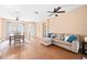 Bright dining room features hardwood floors and lots of natural light at 914 Shadowmoss Dr, Winter Garden, FL 34787