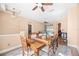 Bright dining area with hardwood floors and wood table set at 914 Shadowmoss Dr, Winter Garden, FL 34787