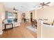 Elegant dining room with hardwood floors and a view to living room at 914 Shadowmoss Dr, Winter Garden, FL 34787