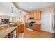 Spacious kitchen with stainless steel appliances and granite countertops at 914 Shadowmoss Dr, Winter Garden, FL 34787