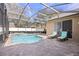 Inviting screened pool and patio area, perfect for relaxation at 914 Shadowmoss Dr, Winter Garden, FL 34787