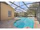 Spacious screened-in pool and patio area with lounge chairs at 914 Shadowmoss Dr, Winter Garden, FL 34787