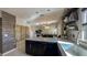 Modern eat-in kitchen featuring stainless steel appliances, pendant lighting and a center island at 376 Willet St, Haines City, FL 33844