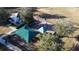 An aerial shot shows a playground with a climbing structure, slides, and seating area at 376 Willet St, Haines City, FL 33844