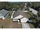 Aerial view of a single-Gathering home with fenced yard at 110 Oak St, Clermont, FL 34711