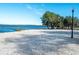 Scenic view of a sandy beach along the lake at 110 Oak St, Clermont, FL 34711