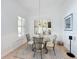 Breakfast nook with glass table and four chairs, features window seating at 12812 Jacob Grace Ct, Windermere, FL 34786