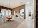 Formal dining room adjacent to living area and kitchen at 12812 Jacob Grace Ct, Windermere, FL 34786