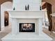 Large, ornate fireplace as a focal point of the room at 12812 Jacob Grace Ct, Windermere, FL 34786