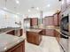 Gourmet kitchen with stainless steel appliances and granite countertops at 12812 Jacob Grace Ct, Windermere, FL 34786