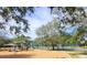 Community park featuring a playground, tennis courts, and shaded areas at 12812 Jacob Grace Ct, Windermere, FL 34786