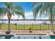 Stunning pool and expansive lake view from backyard at 12812 Jacob Grace Ct, Windermere, FL 34786