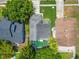 Aerial view of property featuring mature trees and fenced backyard at 13111 Point O Wood Ct, Orlando, FL 32828