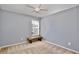 Cozy bedroom with ceiling fan and neutral decor at 13111 Point O Wood Ct, Orlando, FL 32828