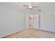 Well-lit bedroom with neutral walls and carpet flooring at 13111 Point O Wood Ct, Orlando, FL 32828