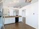Bright kitchen with granite countertops, white cabinets, and stainless steel refrigerator at 13111 Point O Wood Ct, Orlando, FL 32828