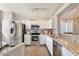 Modern kitchen with stainless steel appliances and granite countertops at 13111 Point O Wood Ct, Orlando, FL 32828