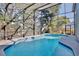 Inviting screened pool with ample space for swimming and relaxation at 13111 Point O Wood Ct, Orlando, FL 32828