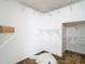 Spacious walk-in closet with ample shelving for organized storage at 13111 Point O Wood Ct, Orlando, FL 32828