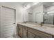 Modern bathroom with double vanity and quartz countertop at 13552 Autumn Harvest Ave, Winter Garden, FL 34787