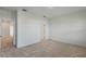 Spacious bedroom with carpet and access to hallway at 13552 Autumn Harvest Ave, Winter Garden, FL 34787