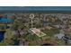 Property location shown with respect to lake and neighboring houses at 140 Gladesdown Ct, Deland, FL 32724